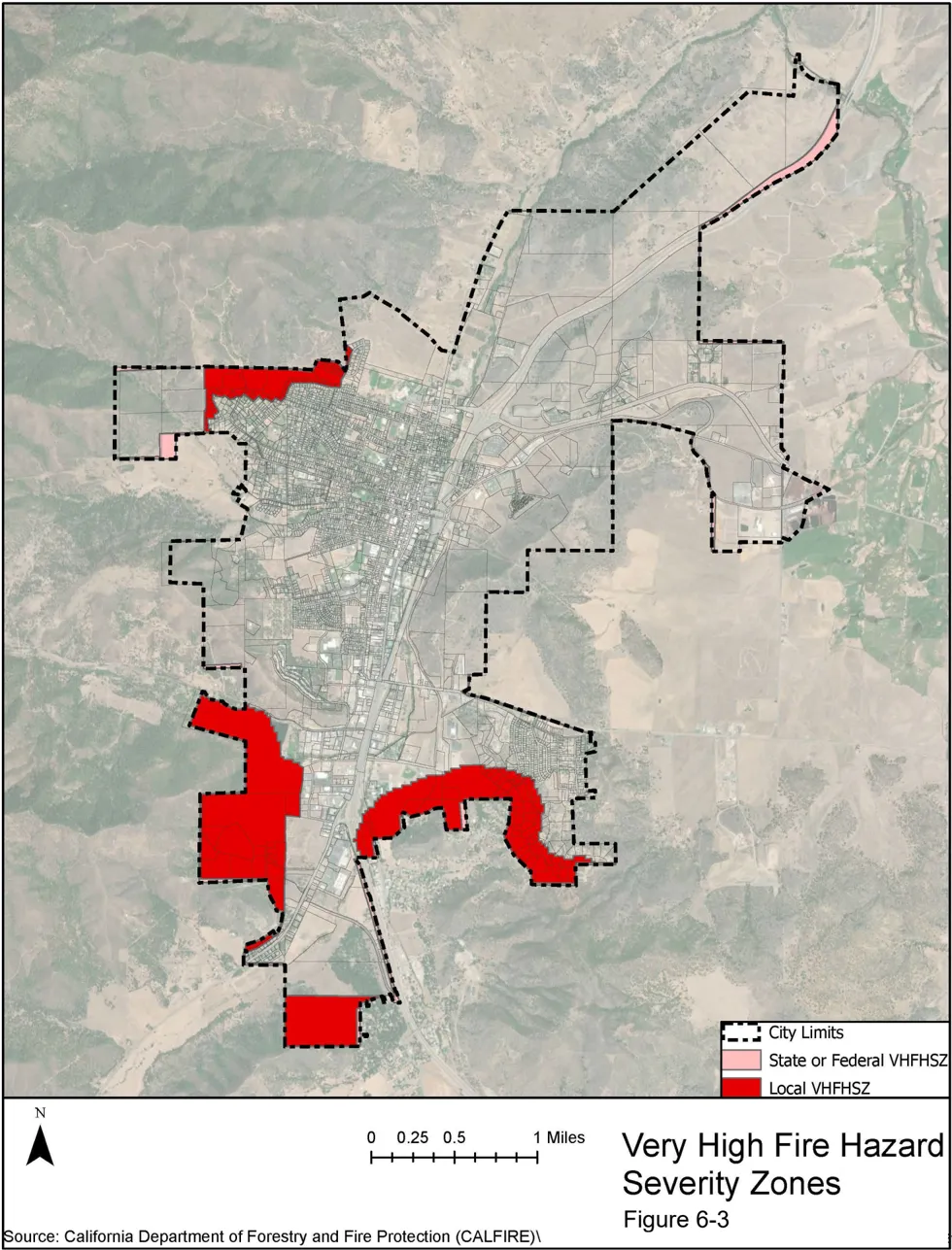 Aerial map of the City of Yreka showing Very High Fire Hazard Severity Zones as designated by CAL FIRE. Local VHFHSZ areas are shown in red, concentrated along the southern and southwestern edges of the city limits. A small State or Federal VHFHSZ area shown in pink appears along the northeastern city boundary. The majority of the city’s central and eastern areas are not within a very high fire hazard zone.